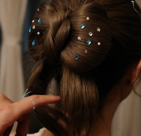 Ribbon bow set in styled hair